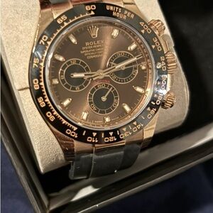Rolex Daytona with Black and Gold Accents